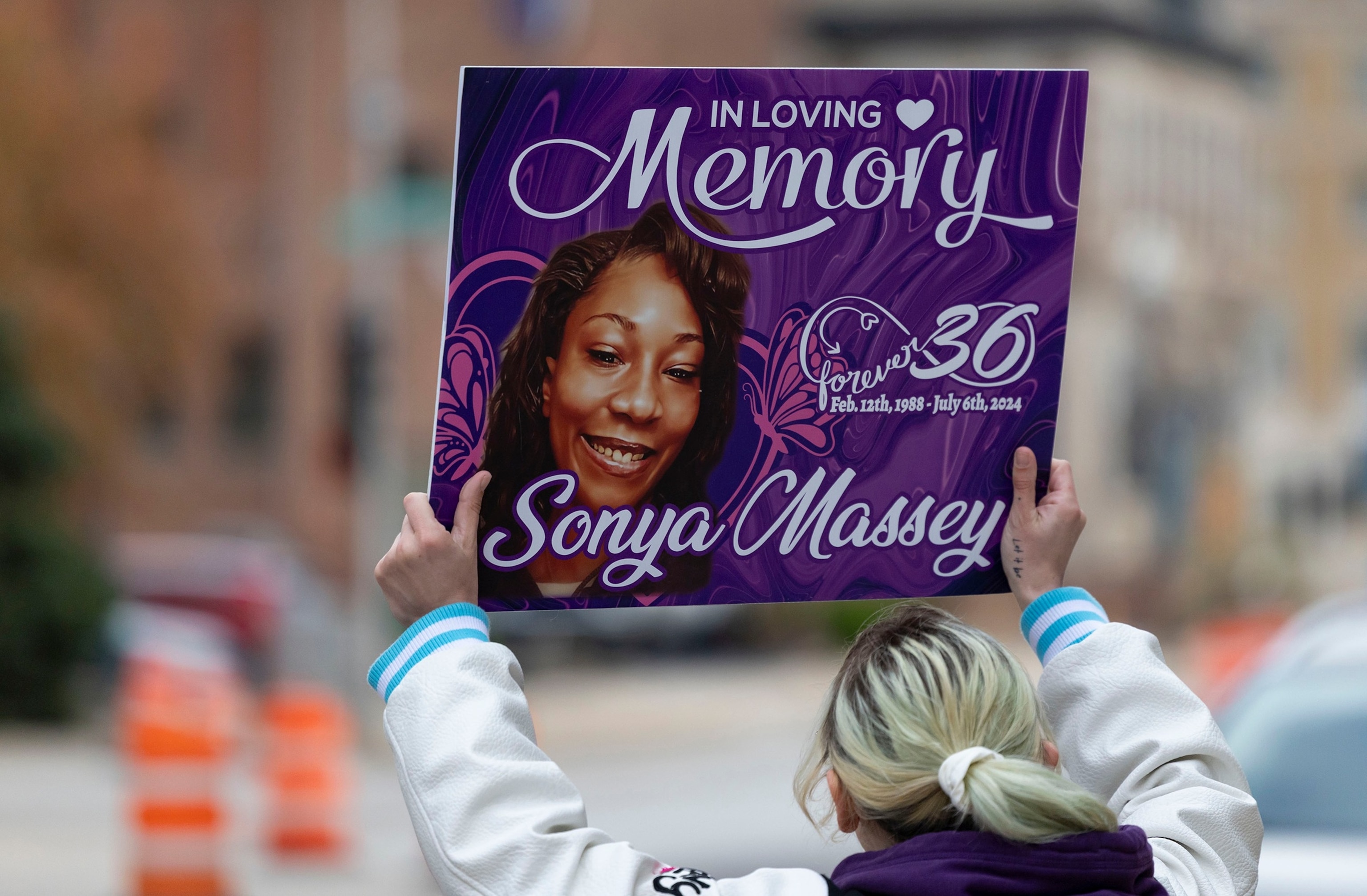 Kala McGuire, of Springfield, Illinois, rallies outside the Peoria County Courthouse on Oct. 22, 2025, on the first day in the trial of Sean Grayson, the former Sangamon County sheriffâs deputy charged with killing Sonya Massey in her Springfield home last year.Chicago Tribune/TNS via Getty