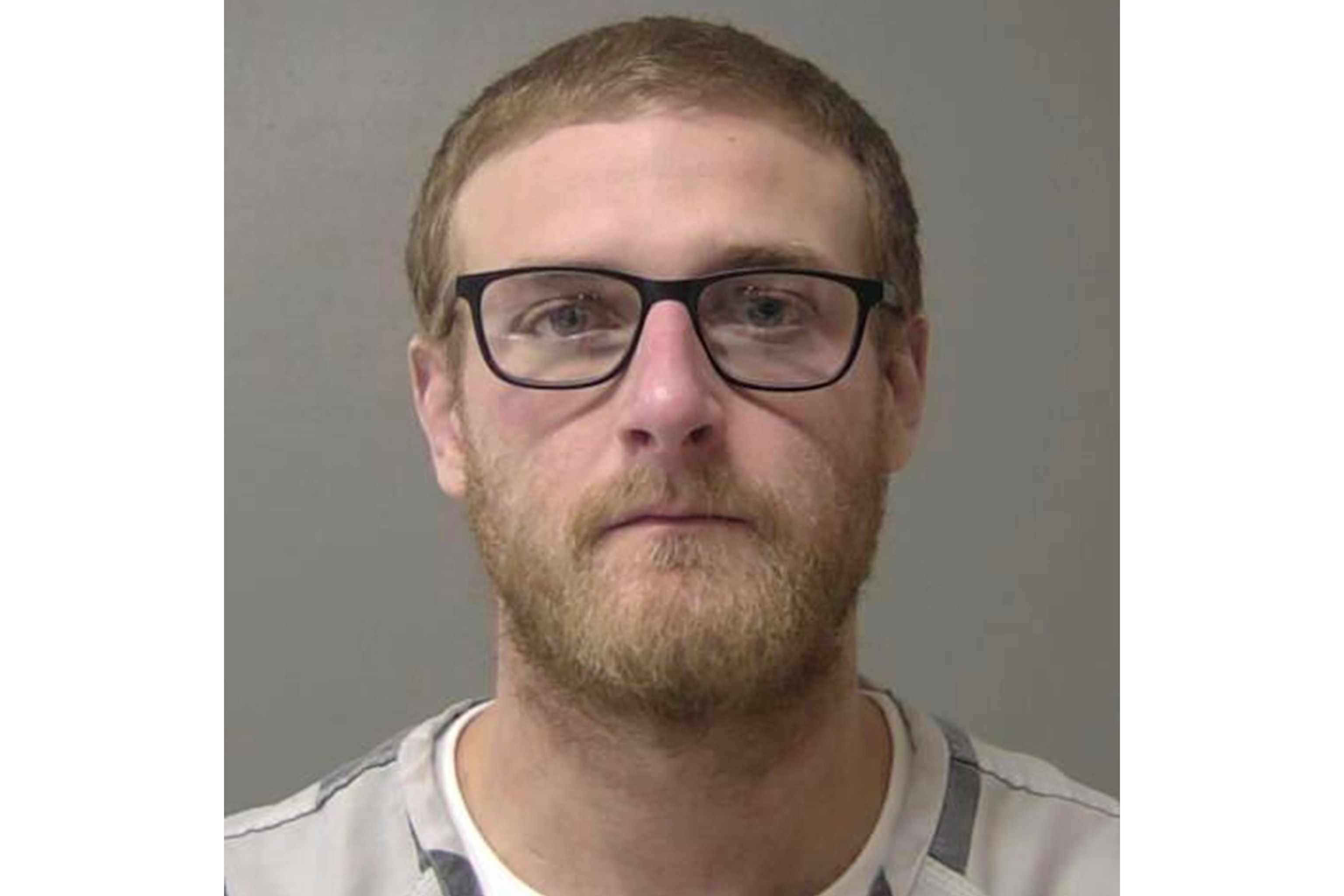 This booking photo provided by the Macon County, Ill., Jail in January 2025, shows Sean Grayson, a former Sangamon County Sheriff's deputy who is charged with first-degree murder in the shooting death of Sonya Massey on July 6, 2024, in Springfield, Ill.AP