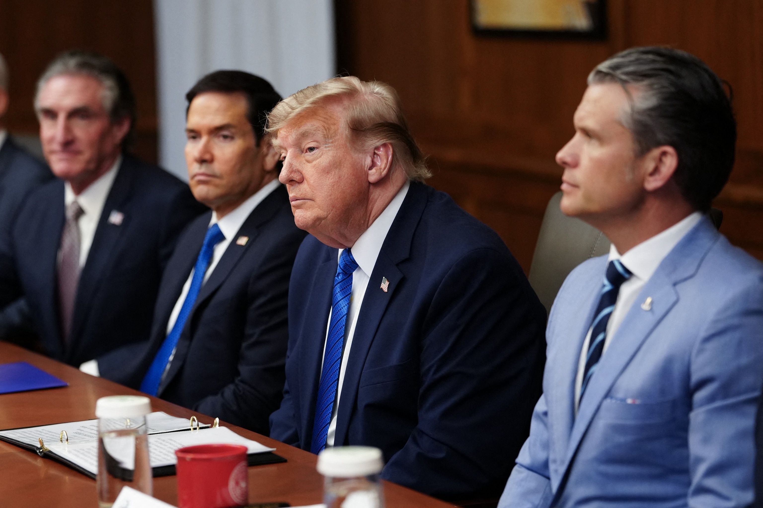 Secretary of the Interior Doug Burgum, Secretary of State Marco Rubio, President Donald Trump and Secretary of Defense Pete Hegseth attend a Cabinet meeting at Camp David in Maryland, July 31, 2026.Aaron Schwartz/AFP via Getty Images