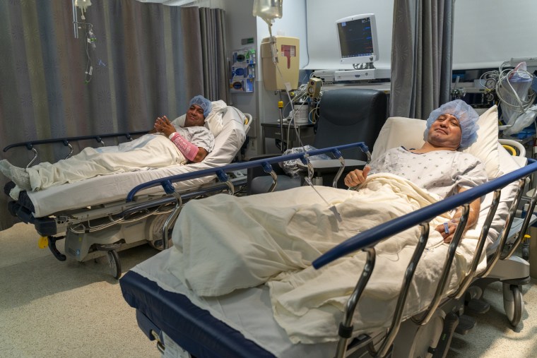 José Alfredo Pacheco, left, and José Gregorio González prepare for a living kidney transplant on Aug. 14, 2025, at University of Illinois Hospital.Hoss Fatemi / UI Health Marketing