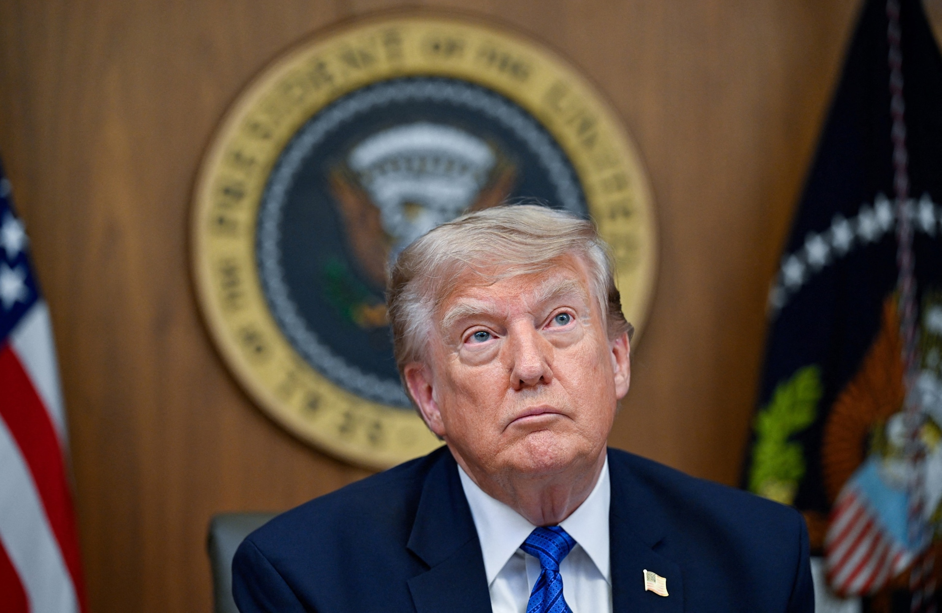 President Donald Trump listens to questions from reporters during a Cabinet meeting at Camp David, the presidential retreat, July 31, 2026 in Camp David, Maryland.Daniel Heuer/Reuters