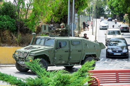 Spanish soldiers in Ceuta on Saturday.Photograph: Fabian Bimmer/Reuters