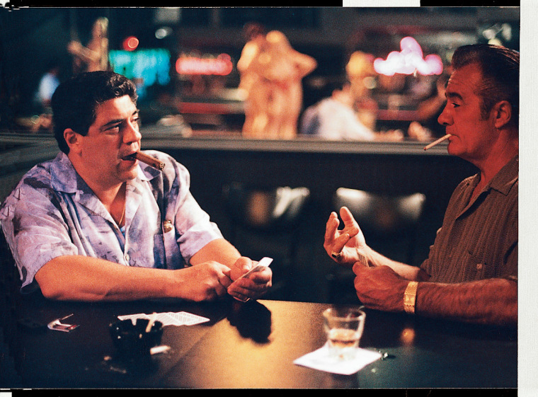 Vincent Pastore, left, and Tony Sirico playing cards in a scene from 'The Sopranos', c. 1999.Anthony Neste / Getty Images