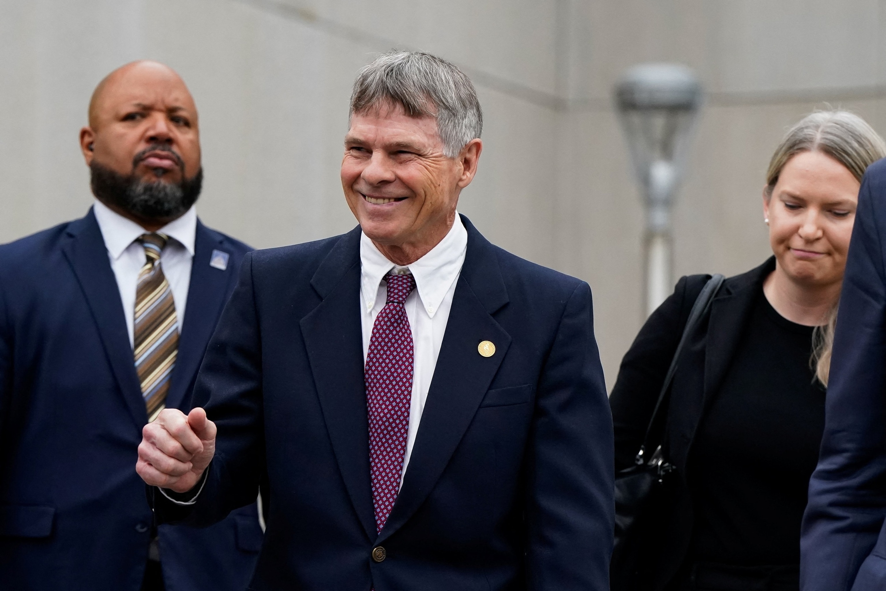 Former U.S. Olympic canoeist David Hearn exits the courthouse following his arraignment on a felony destruction of property charge related to vandalizing the Lincoln Memorial Reflecting Pool, at DC Superior Court in Washington, July 9, 2026.Elizabeth Frantz/Reuters, FILE
