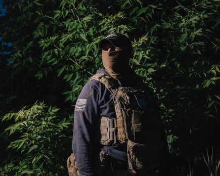 Panama, a senior sergeant with Ukraine’s ‘Kairos’ strike-drone battalion, says he has made peace with the summer’s swarming mosquitoes: ‘They are inhabitants of free Ukraine.’Photograph: Alessio Mamo/The Guardian
