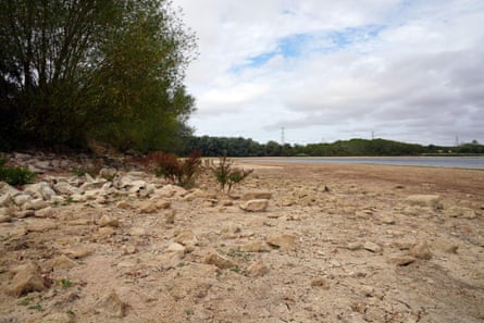 The dried-mud basin of Grafham Water, in Cambridgeshire. The local MP Pippa Heylings says a lack of water is a ‘deal-breaker’ for the government’s growth plans for the county.Photograph: PA Images/Alamy