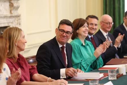 Powell sits next to Andy Burnham during his first cabinet meeting as prime minister.Photograph: Chris Ratcliffe/EPA