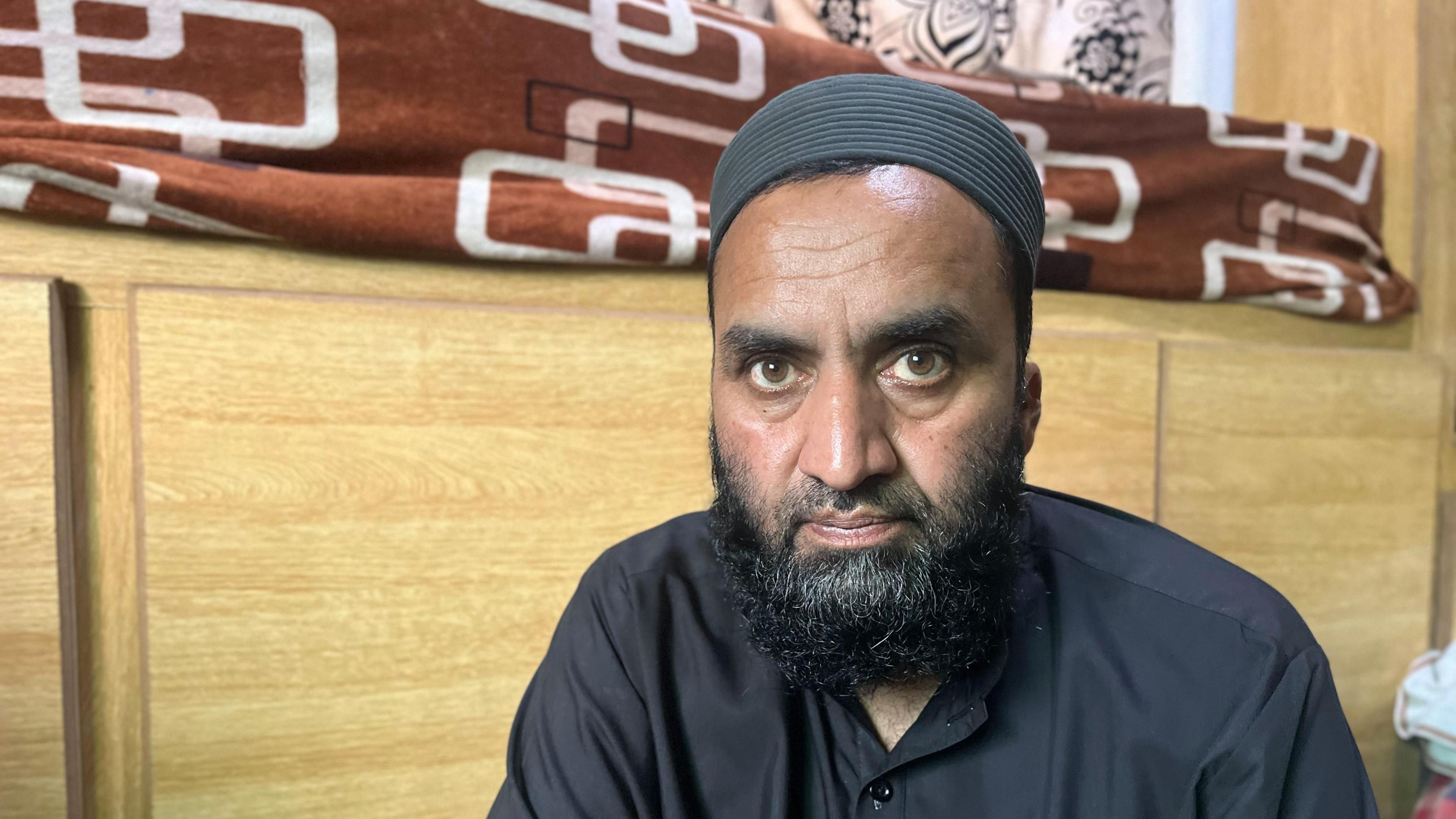 Image caption,Umar Nazir says without providing evidence that the authorities have infiltrated the JAAC.