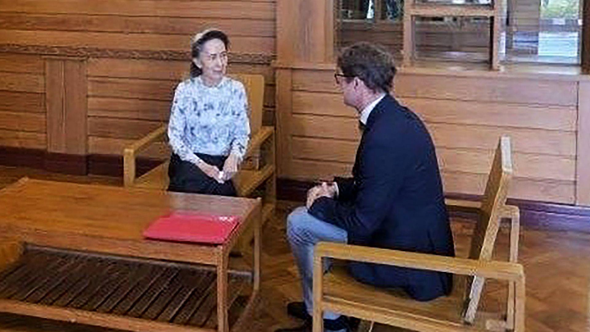 Image caption,Aung San Suu Kyi, seen here talking to the ICRC representative, was recently moved to house arrest