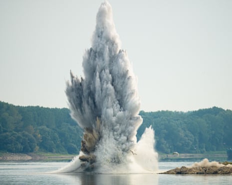 The Romanian Navy detonates underwater explosives during a controlled demolition of submerged rocks to improve water flow to the Cernavodă Nuclear Power Plant amid exceptionally low water levels on the Danube River, in Izvoarele, Romania.Photograph: Andreea Alexandru/AP