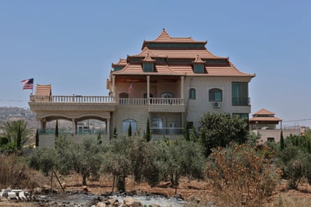 A US flag flies at a Palestinian home in Turmus Ayya.Photograph: Quique Kierszenbaum/The Guardian