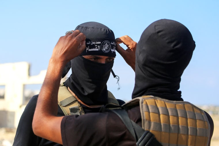 Members of the Ezzedine al-Qassam Brigades, the military wing of Hamas, in the central Gaza Strip in 2025.Bashar Taleb / AFP via Getty Images