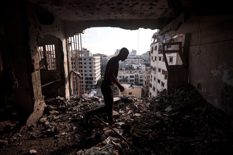 The site of an Israeli airstrike on a residential building in Gaza City on Sunday.Majdi Fathi / NurPhoto via Getty Images
