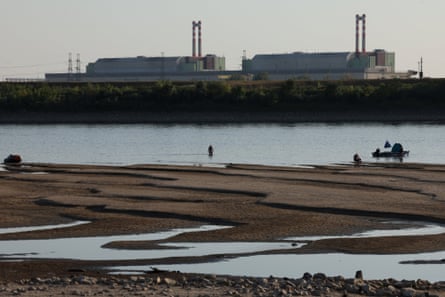 The partially dried-up Danube outside the Paks nuclear plant in Hungary.Photograph: Bernadett Szabó/Reuters