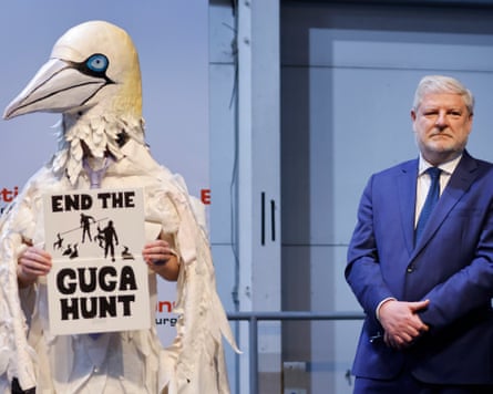 A candidate stood for the Holyrood seat of Edinburgh Central in protest against the hunt.Photograph: Murdo MacLeod/The Guardian