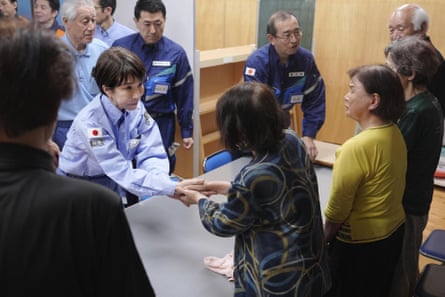 Sanae Takaichi greets evacuees in Hikawa in the southern Kumamoto prefecture after a major earthquake hit.Photograph: undefined/Japan Pool/Kyodo News/AP