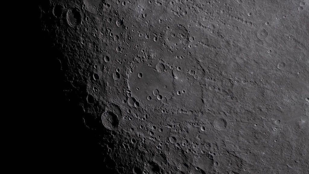 Image caption,The Moon's surface bears witness to countless other impacts over a period of millions of years