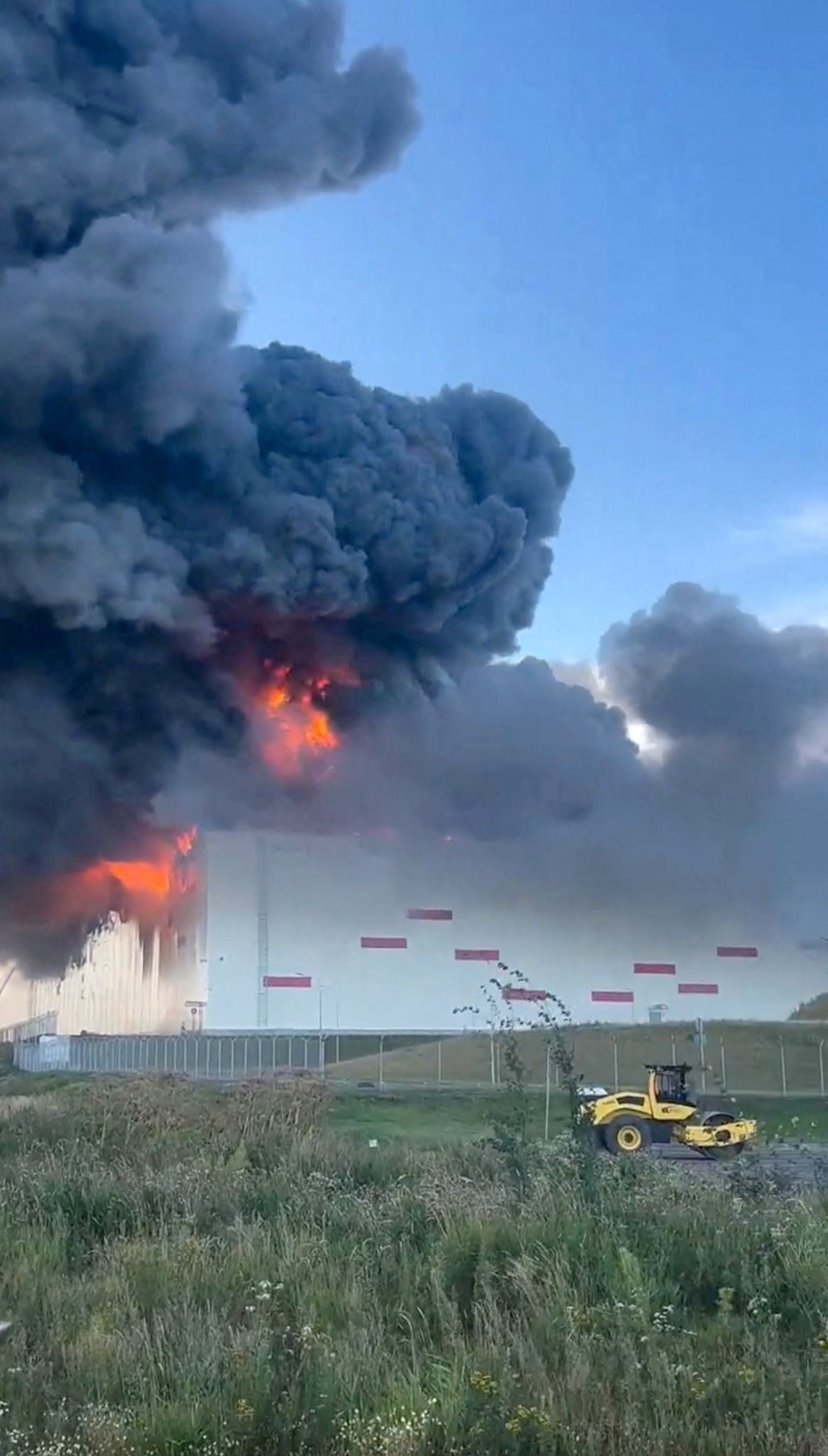 Smoke rises after a Ukrainian drone attack on a Wildberries warehouse, in Krasny Bor, Leningrad Region, Russia, on Aug. 4, 2026, in this still image obtained from a video.Social Media/via Reuters