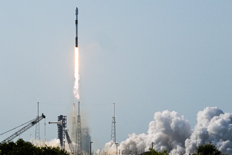 A SpaceX Falcon 9 rocket launches in Cape Canaveral, Florida, on July 21.Chandan Khanna / AFP via Getty Images