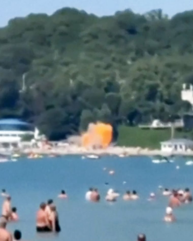 A screen grab of a drone explosion on a beach at the holiday village of Arkhipo-Osipovka, Gelendzhik resort area, in Russia on Monday.via Reuters