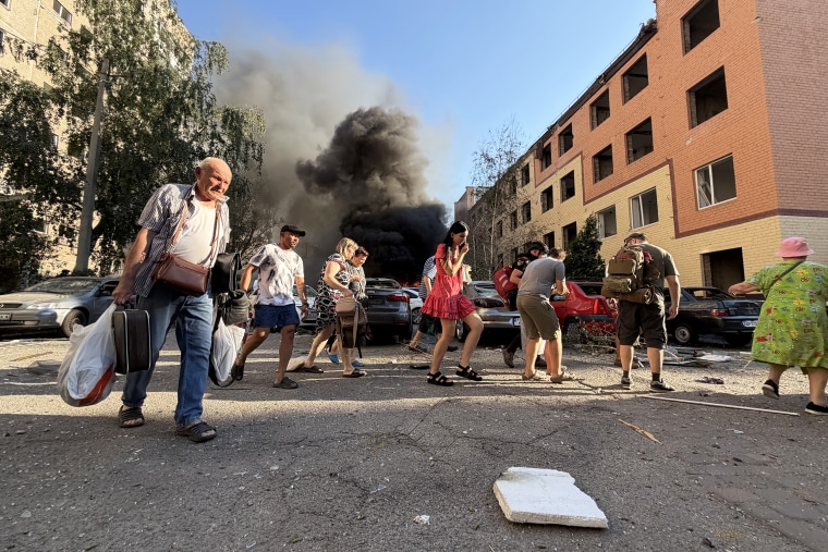 The site of a Russian airstrike in Zaporizhzhia, Ukraine, on Sunday.Darya Nazarova / AFP via Getty Images