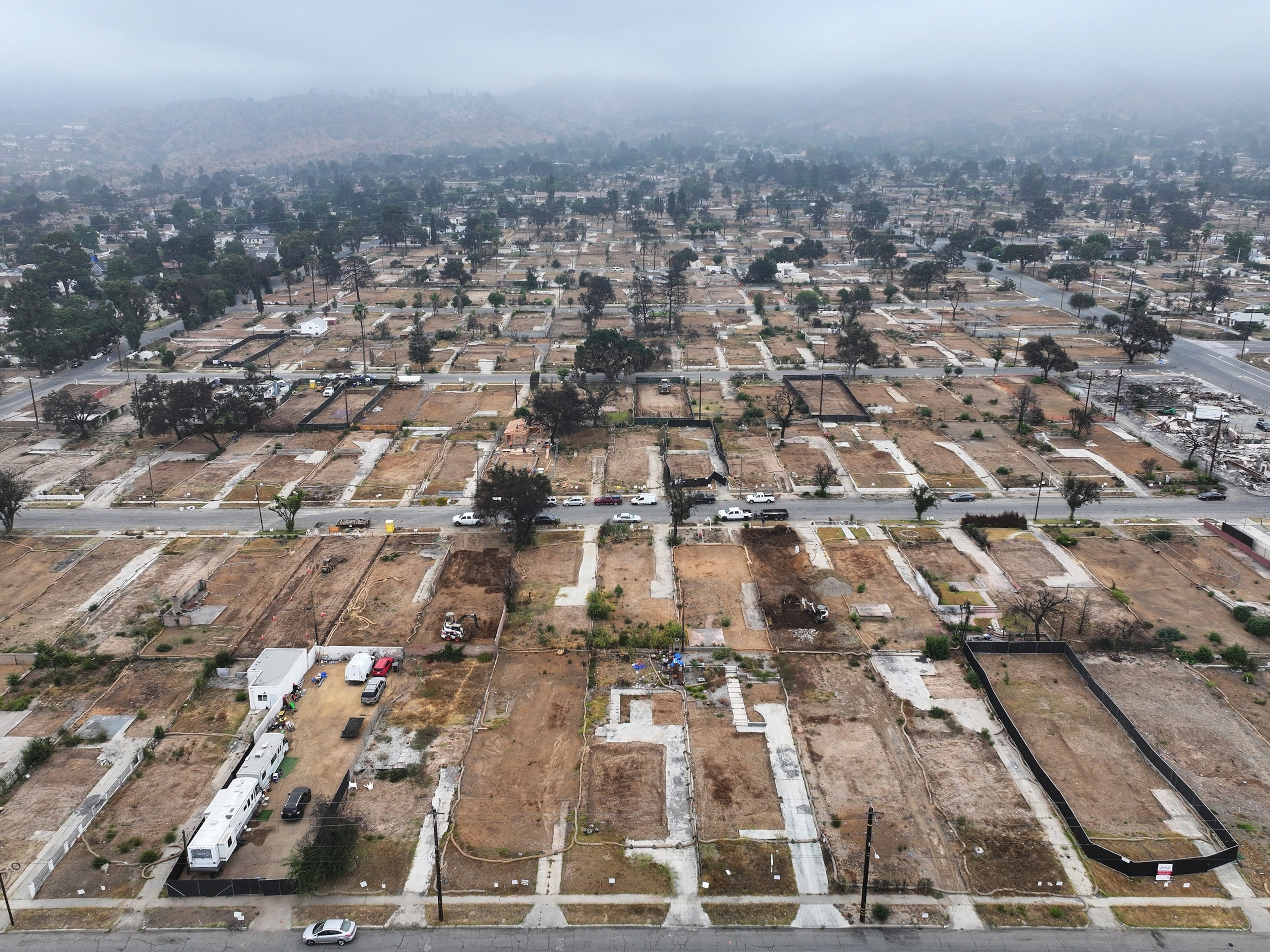An aerial view of cleared properties that burned in the Eaton Fire, Aug. 15, 2025, in Altadena, California.Mario Tama/Getty Images