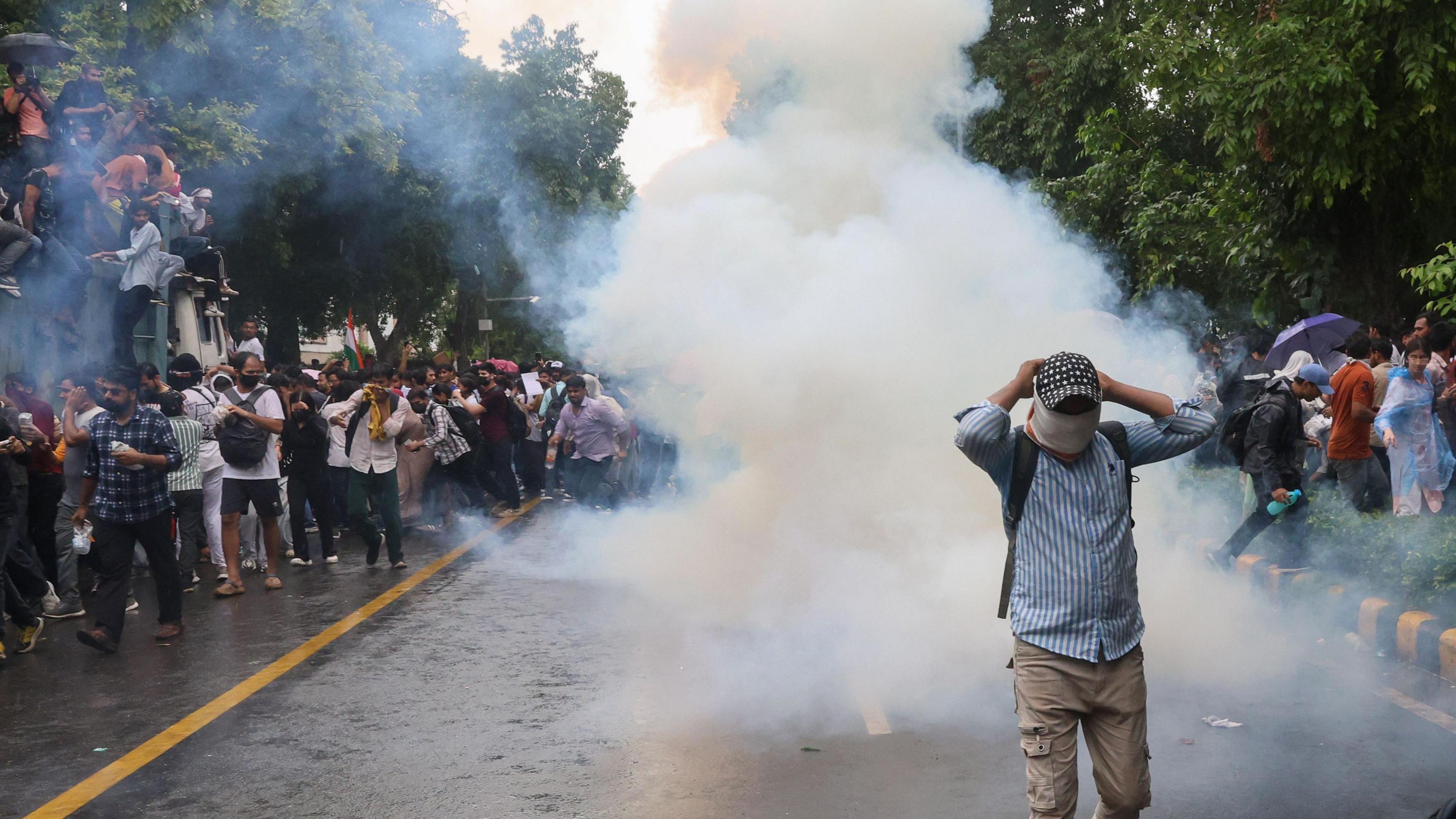 Image caption,Police used tear gas and baton charge to disperse protesters who tried to march to the parliament on 20 July