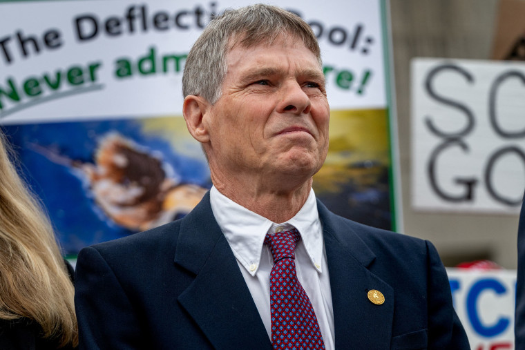 Former Olympian David Hearn outside D.C. Superior Court on July 9.Daniel Heuer / Bloomberg via Getty Images file