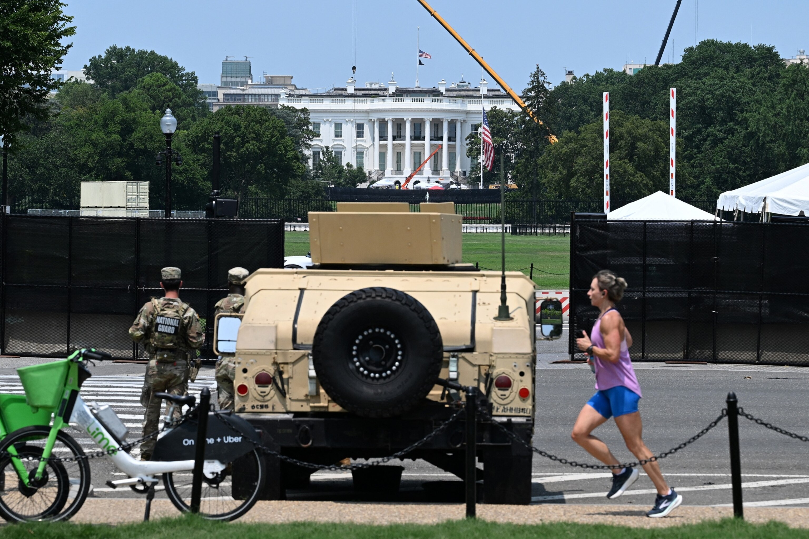 National Guard patrol outside the White House as construction of a new helipad continues in Washington, D.C., on July 15, 2026.Alex Wroblewski/AFP via Getty Images, FIE