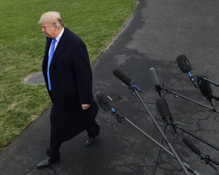 Donald Trump walks away from the press after talking with reporters on the south lawn of the White House on 26 October 2018.Photograph: Susan Walsh/AP