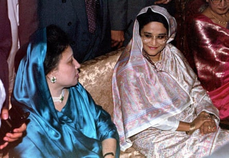 Sheikh Hasina, right, and her former political foe, Khaleda Zia, at a wedding reception in Bangladesh in 1997.Photograph: Reuters