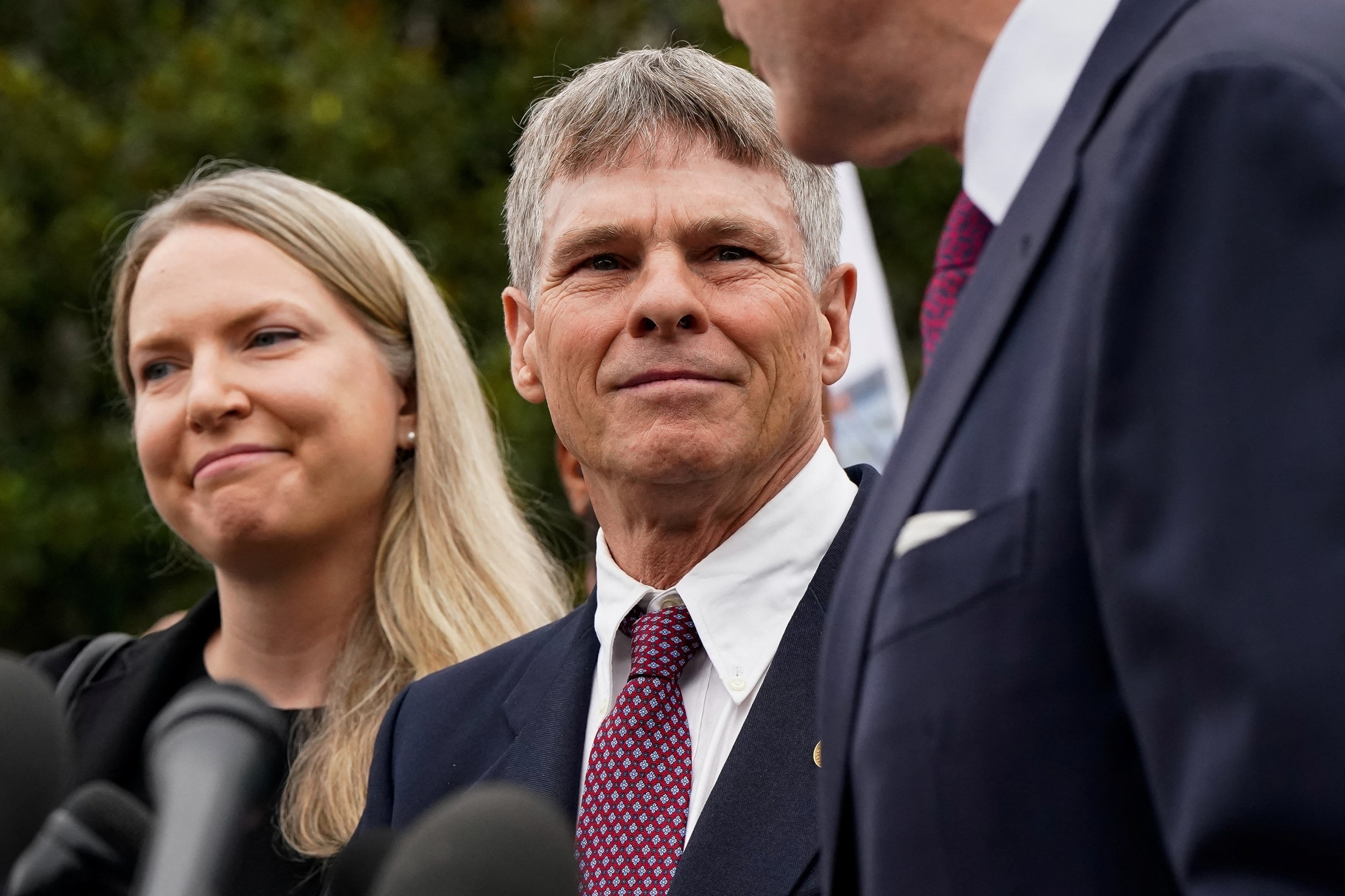 Former U.S. Olympic canoeist David Hearn stands with his lawyer as they speak to reporters following Hearn's arraignment on a felony destruction of property charge related to vandalizing the Lincoln Memorial Reflecting Pool, at DC Superior Court in Washington, July 9, 2026.Elizabeth Frantz/Reuters