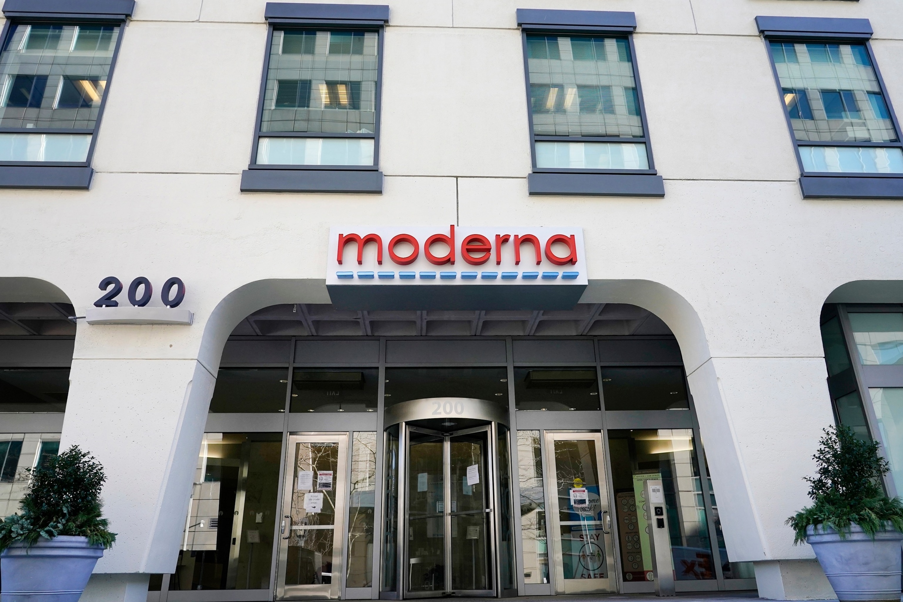 In this Dec. 15, 2020, file photo, the Moderna, Inc. headquarters is shown in Cambridge, Mass.Elise Amendola/AP, FILE