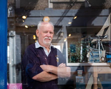 John Spargo, who owns the Tall Ships Trading souvenir shop, said cruise ship passengers who arrive in the town do not bring much money to the area.Photograph: Abbie Trayler-Smith/The Guardian