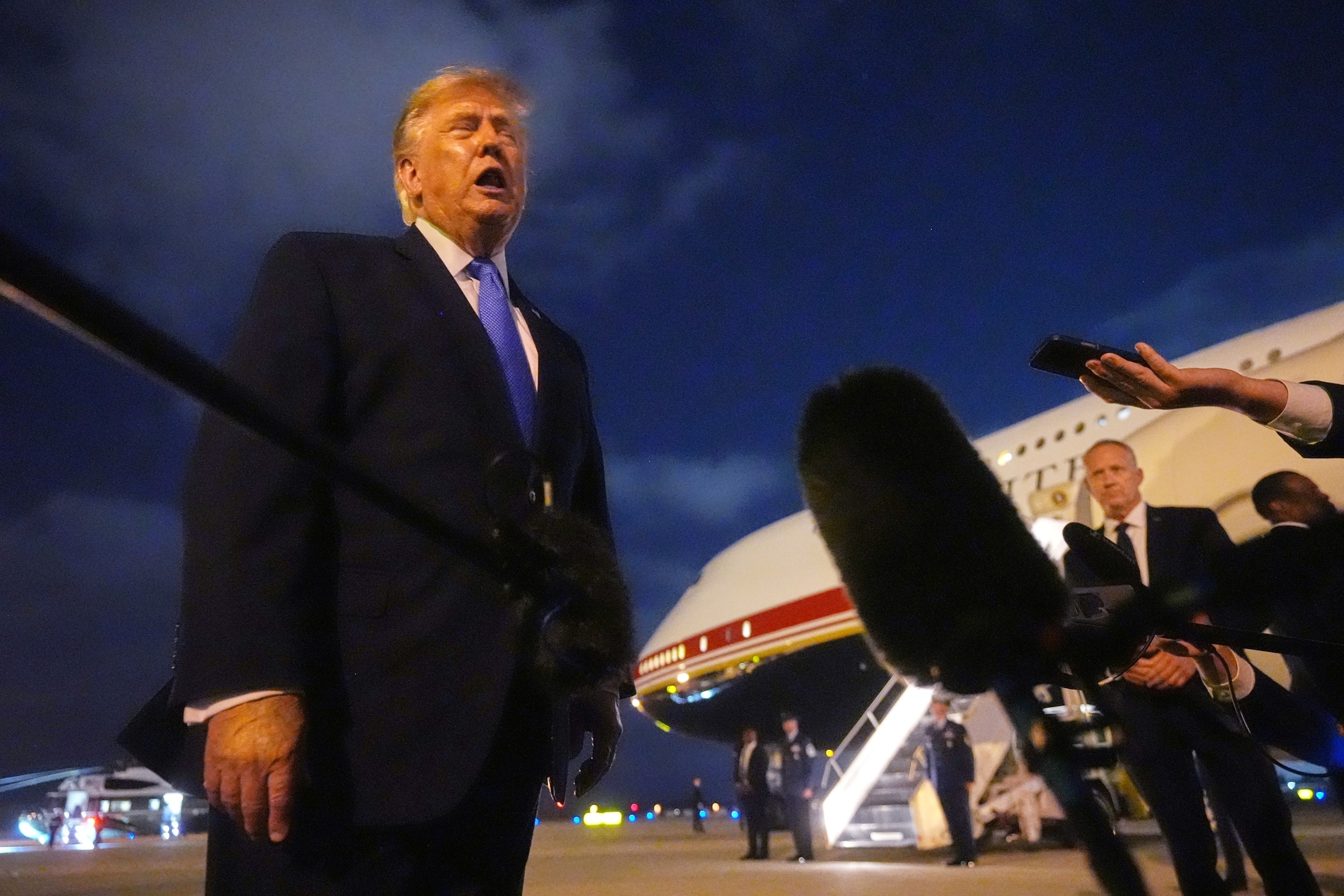 President Donald Trump talks to reporters before he boards Air Force One, Tuesday, Aug. 4, 2026, at Los Angeles International Airport in Los Angeles.Mark Schiefelbein/AP Photo