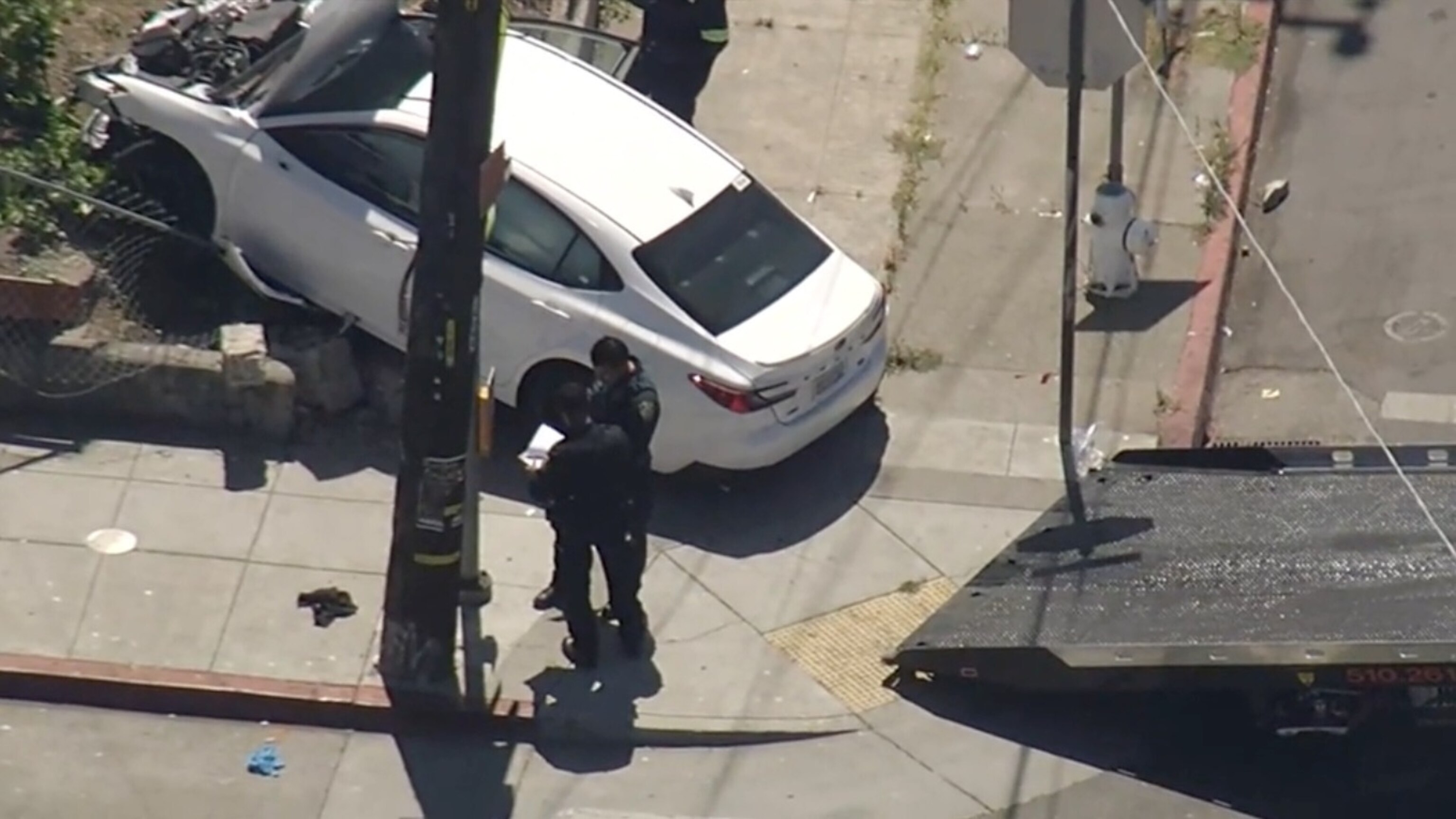A vehicle is seen following a collision that police say injured a woman walking a dog in Oakland, California, Aug. 6, 2026.KGO