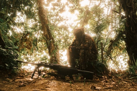 National Liberation Army (ELN) dance during a break from training
