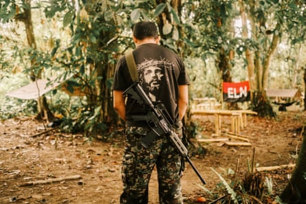 An ELN member at a camp in southern Chocó.Photograph: Santiago Mesa/The Guardian