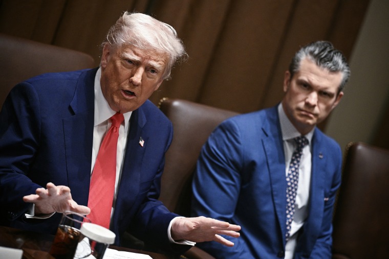 President Donald Trump and Secretary of Defense Pete Hegseth attend a cabinet meeting at the White House in 2025.Brendan Smialowski / AFP via Getty Images file