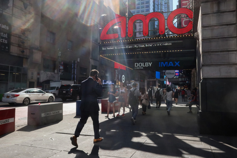 People walk past an AMC movie theater in Manhattan.Gary Hershorn / Getty Images file
