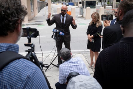 Joseph D McBride, attorney for Andrew and Tristan Tate, talks to the media outside a courthouse, after the hearing of social media influencers brothers in Miami, Florida, on 27 July 2026.Photograph: Marco Bello/Reuters