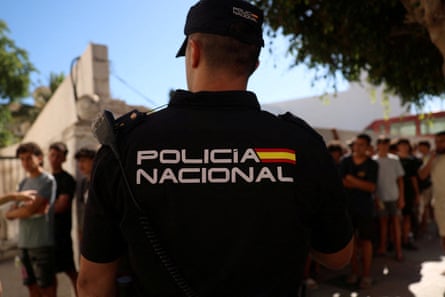 Migrant children queue outside a police station to be registered in Ceuta on Thursday.Photograph: Violeta Santos Moura/Reuters