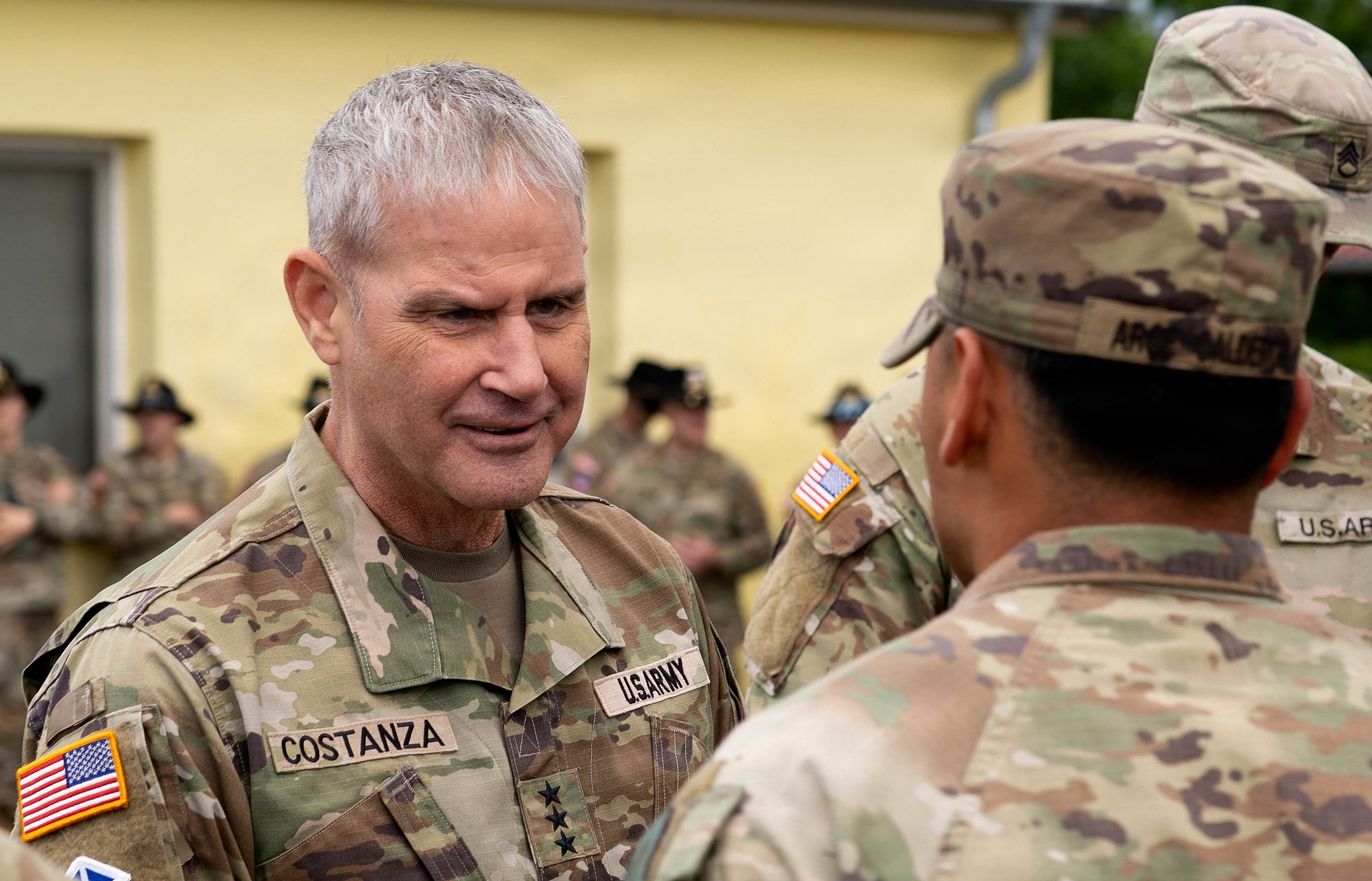 Lt. Gen. Charles Costanza, commanding general of V Corps presents a coin to U.S. Army Staff Sgt. Jesus Arce Calderon during V Corps’ Best Squad Competition awards ceremony at Grafenwohr, Germany, June 11, 2026.Cpl. Grant Hockley/US Army