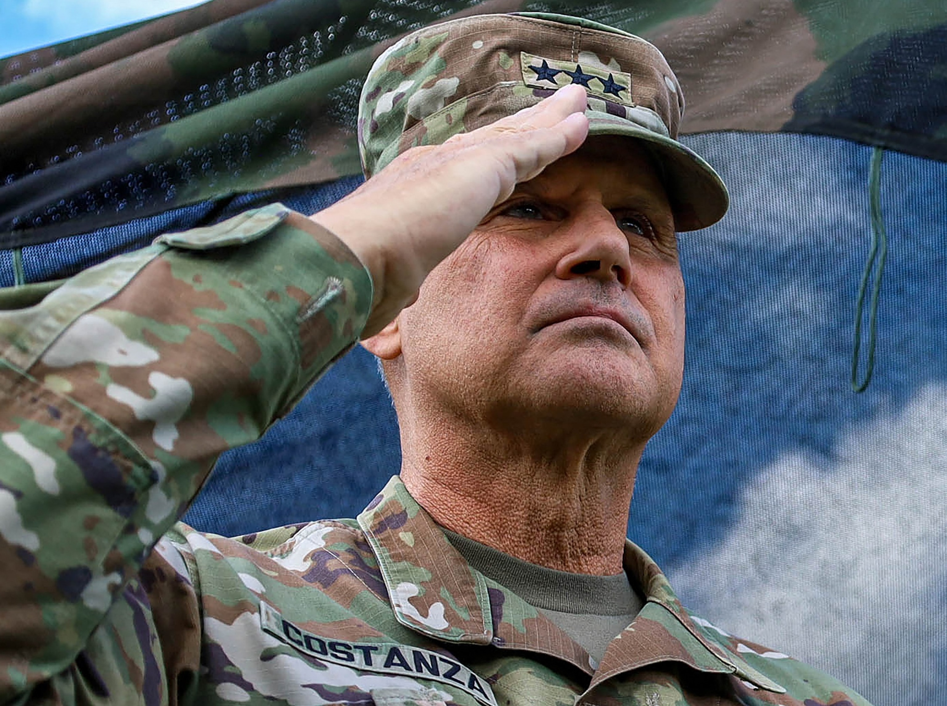 U.S. Army V Corps Commanding General Lt. Gen. Charles Costanza salutes during a ceremony at its forward headquarters at Camp Kosciuszko, Poland, Aug. 6, 2025Sgt. Devin Klecan/US Army