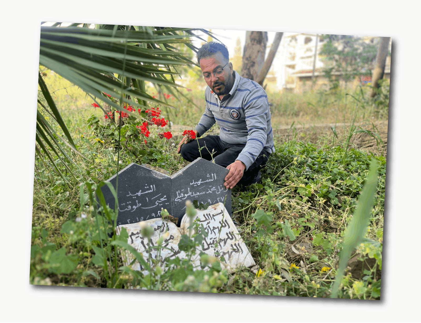 Image caption,Mohammed at the grave of his son, who was killed in a bombing in Homs