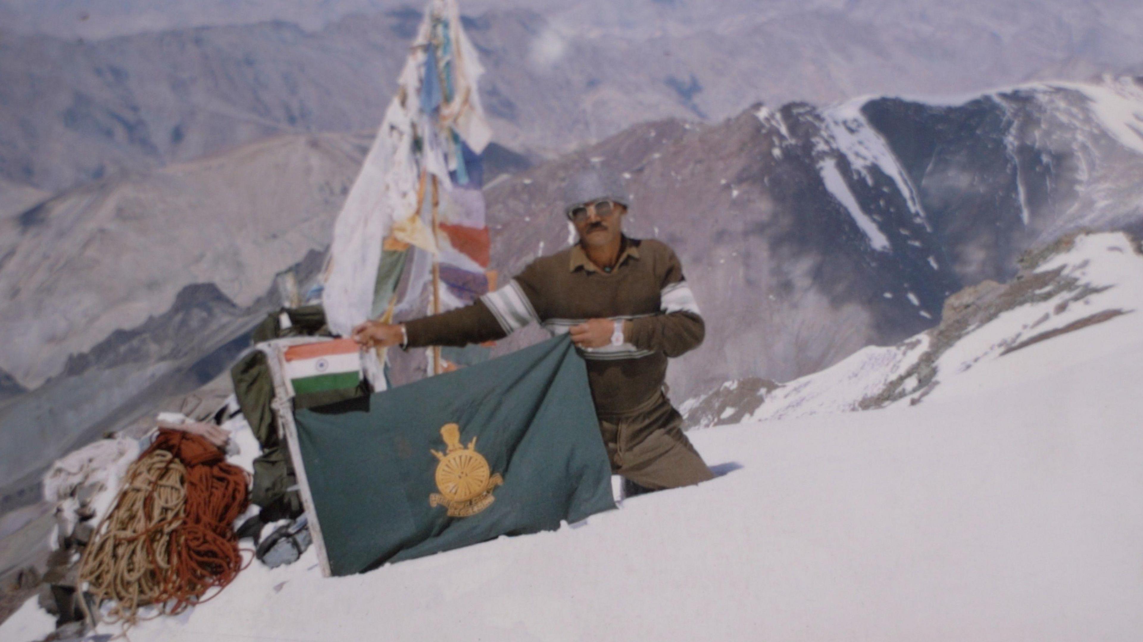 Image caption,The body of Indian climber Dorje Morup who died 30 years ago wearing his green mountaineering boots has become a grim marker along the road to Everest's summit