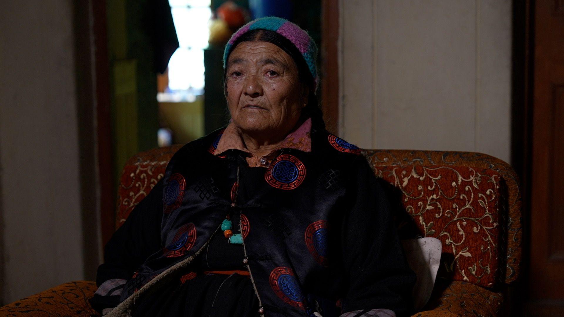 Image caption,Morup's wife, Yangskit, says because she never saw his body, she found it difficult to believe he was dead