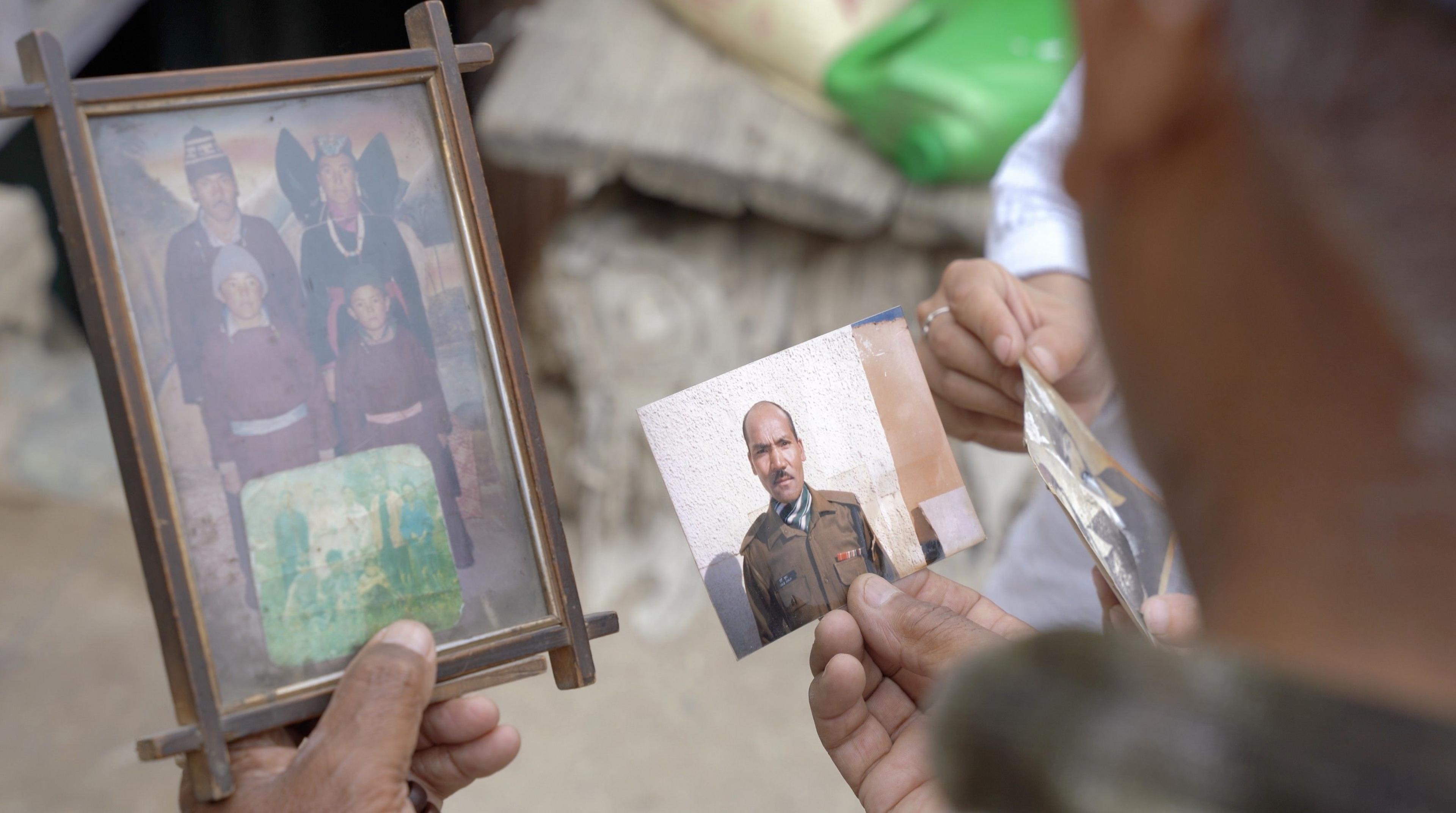 Image caption,Some of photos of Morup and a few of his belongings have helped his family keep his memory alive