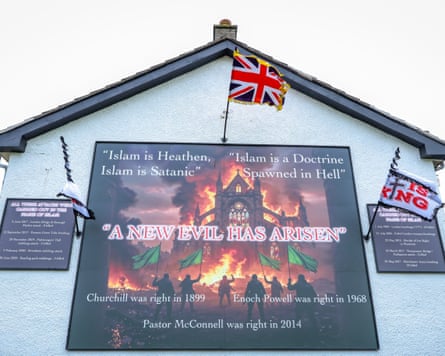AI-generated anti-Islam murals in Newtownabbey.Photograph: Paul Faith/The Guardian