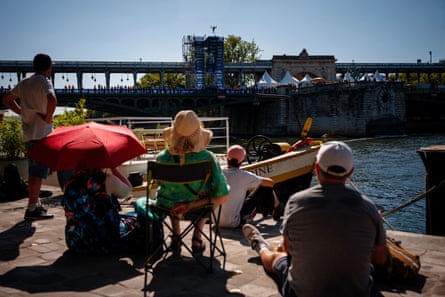 Spectators watch the action from the riverbank.Photograph: Dimitar Dilkoff/AFP/Getty Images